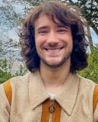 An image of Aidan Seipke against a natural backdrop