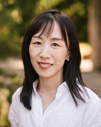 An image of Prof. Yunxiao Xiao against a natural background
