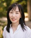 An image of Prof. Yunxiao Xiao against a natural background